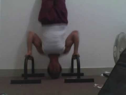 full ROM handstand pushups on parallettes
